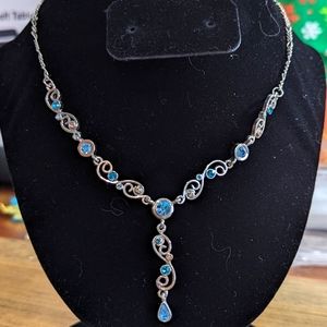 Silvertone Y drop necklace with blue stones